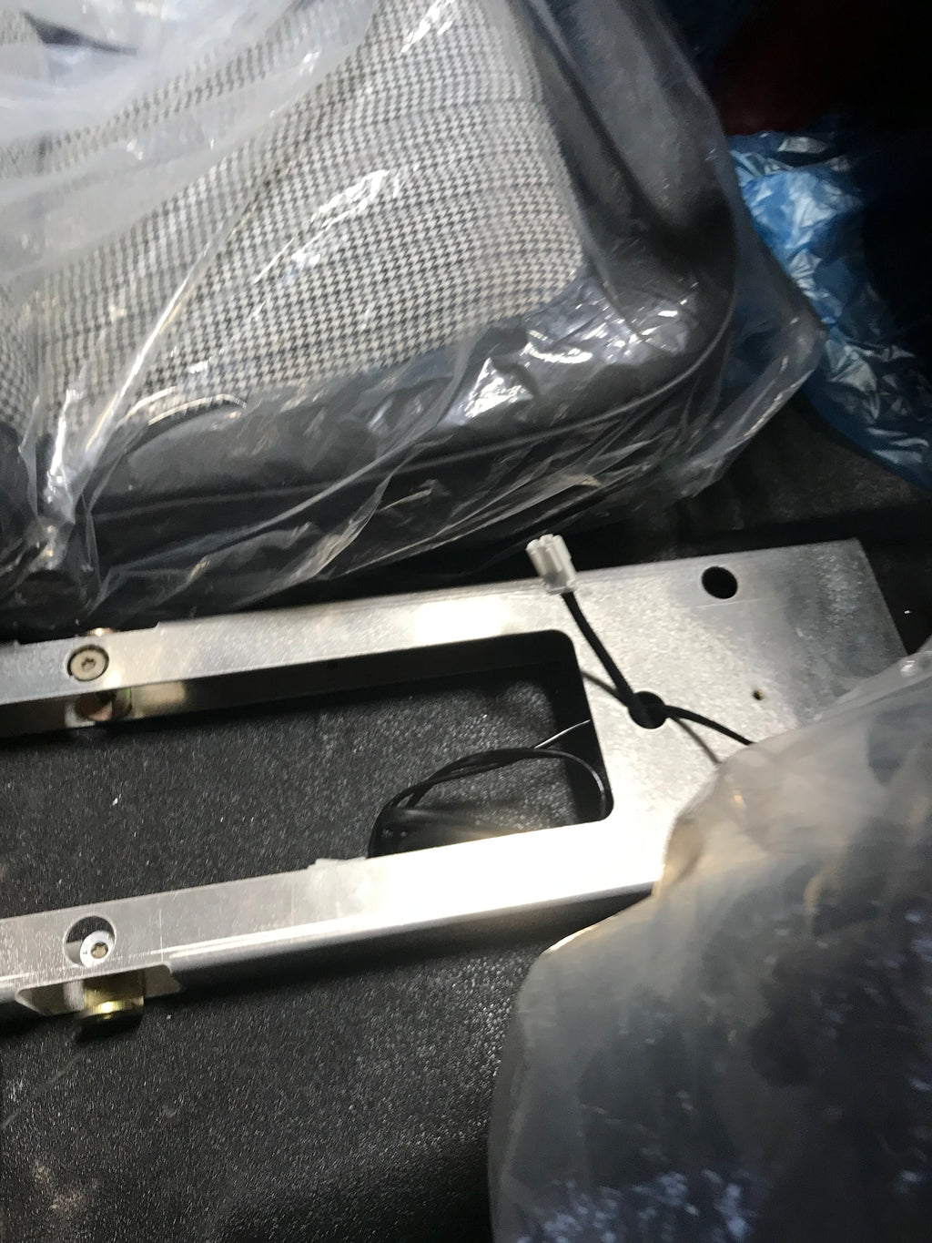 Center console with mounting floor bracket for Broncos