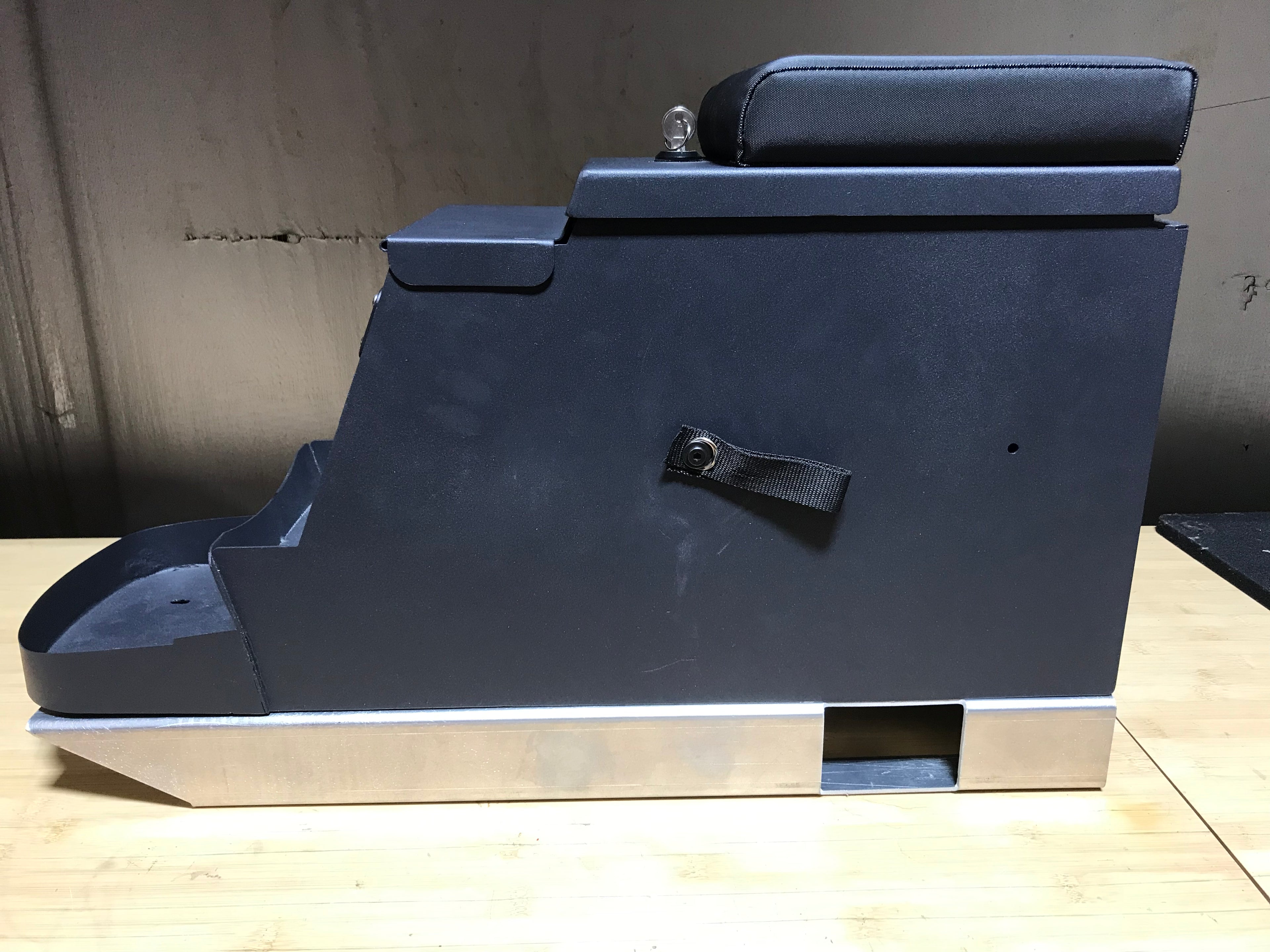 Center console with mounting floor bracket for Broncos