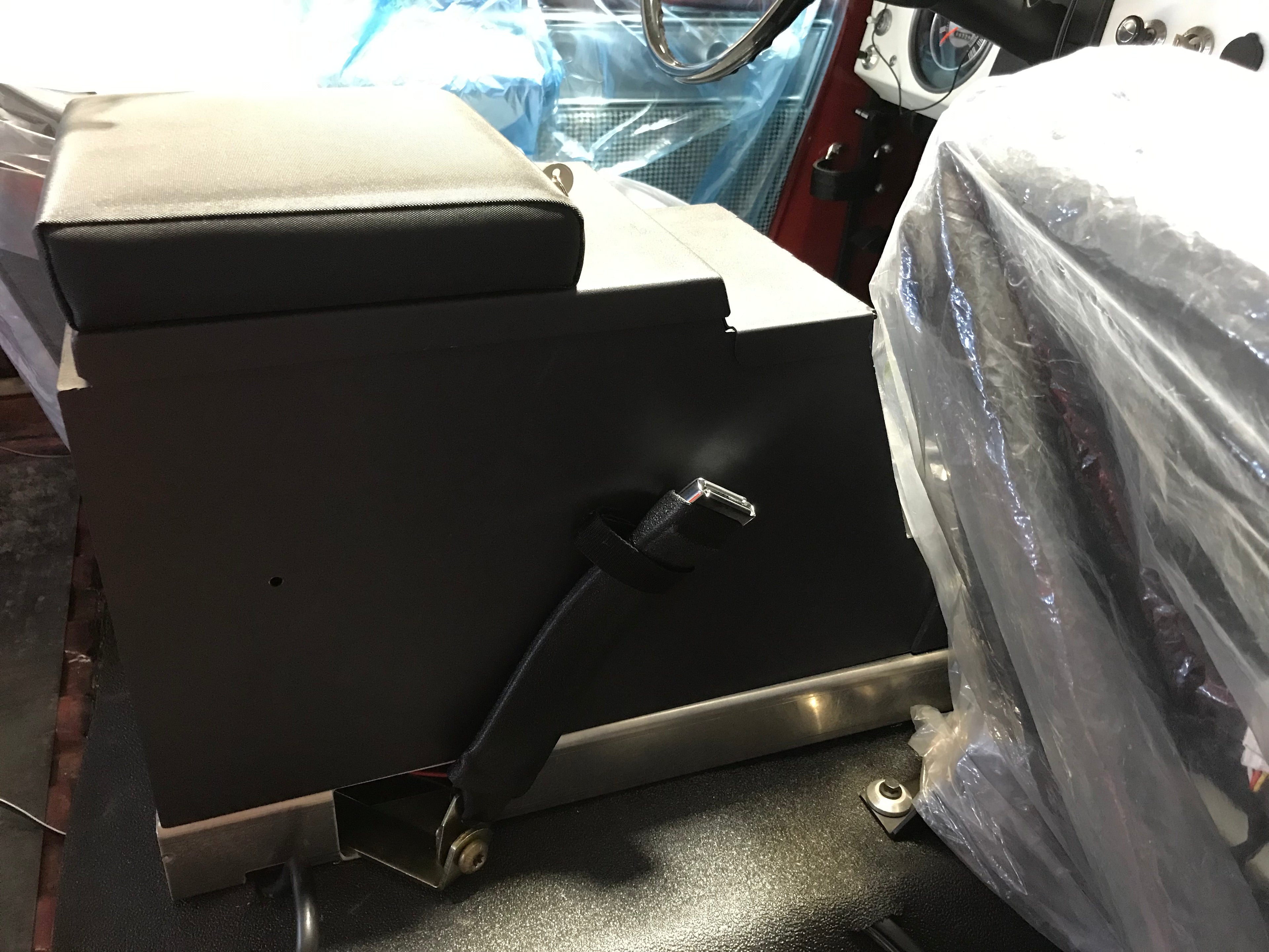Center console with mounting floor bracket for Broncos